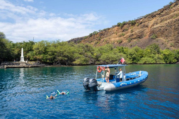 a small boat in a body of water