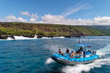 People riding on snorkel boat in Hawaii