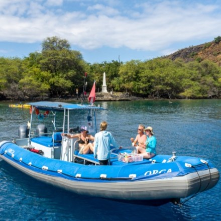 a small boat in a body of water