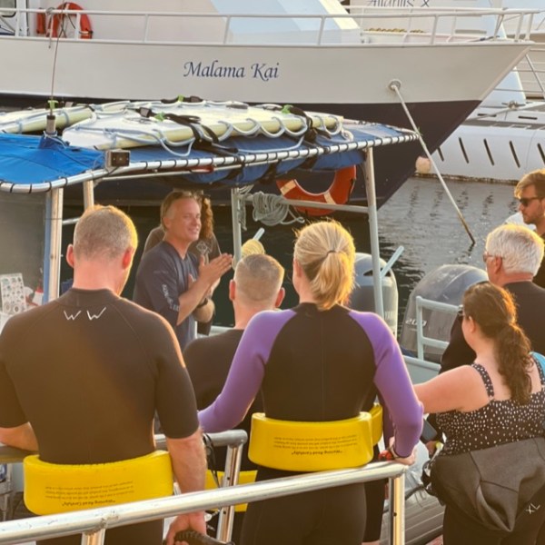 a group of people on a boat