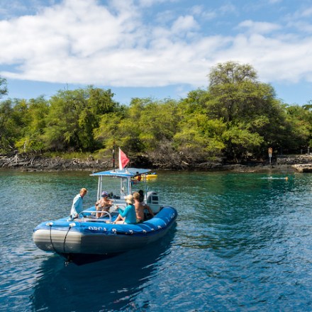 a small boat in a body of water
