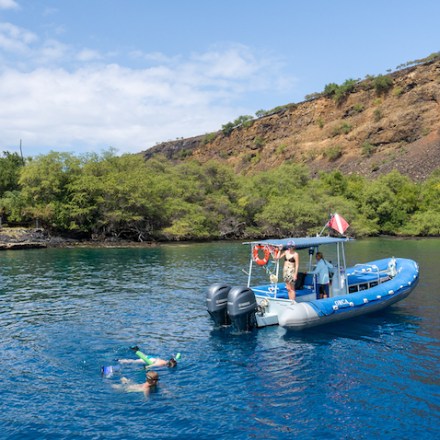 a small boat in a body of water