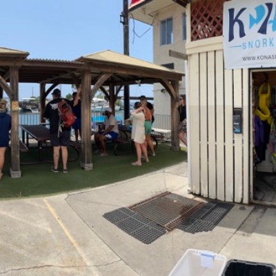 a group of people on a sidewalk