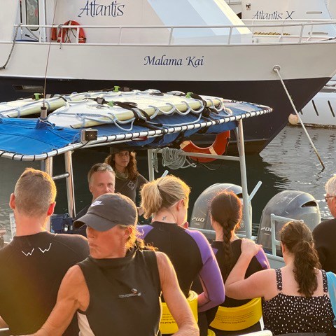 a group of people on a boat