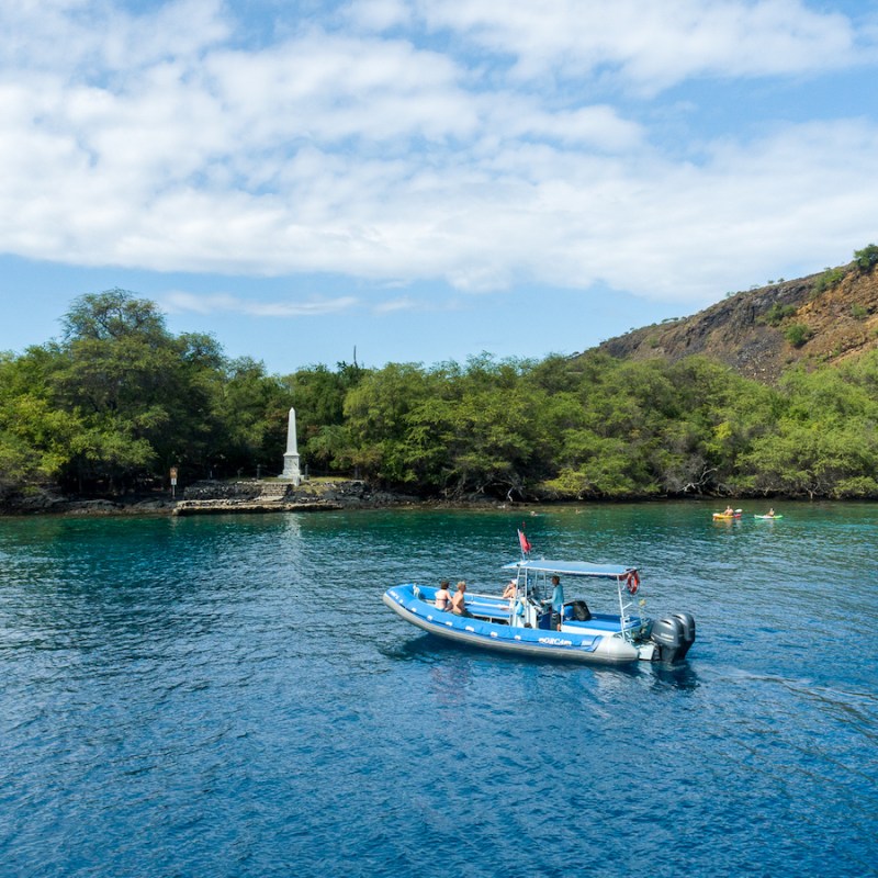 a small boat in a body of water