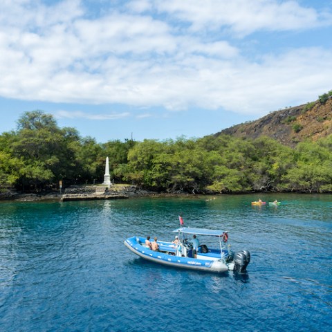 a small boat in a body of water
