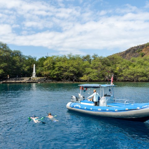 a small boat in a body of water