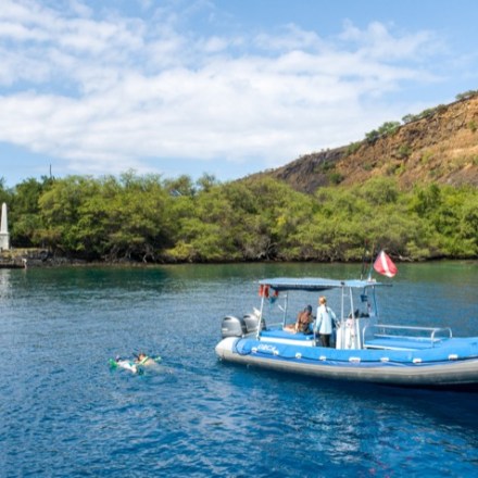 a small boat in a body of water