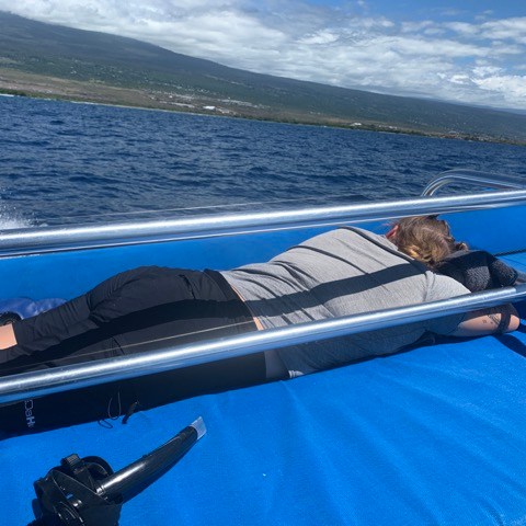 a boat sitting on top of a body of water