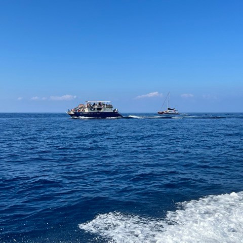 a small boat in a body of water