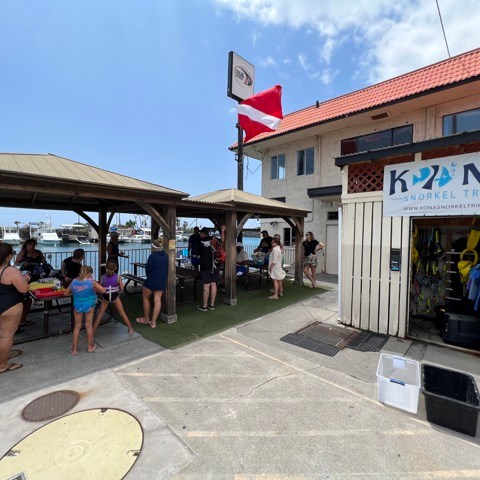 a group of people standing in front of a building