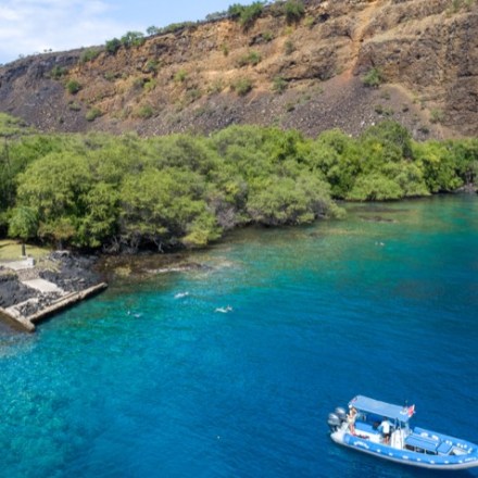 a small boat in a body of water