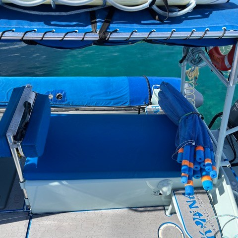 a blue boat sitting on top of a chair