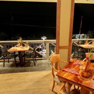 a living room filled with furniture and a fireplace