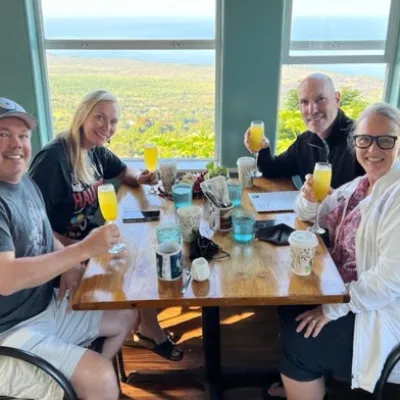 a group of people sitting at a table