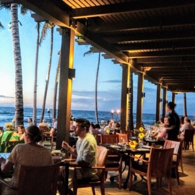 a group of people sitting at a table