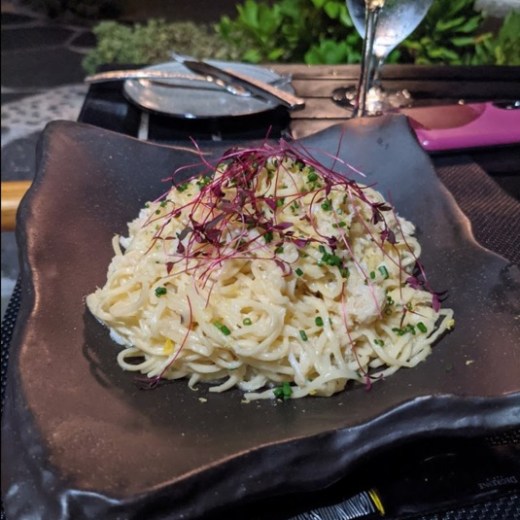 a piece of cake sitting on top of a plate of food