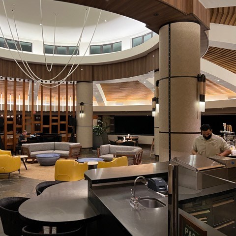 a group of people sitting at a table in a restaurant