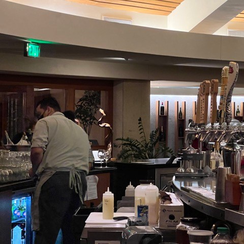 a group of people standing in a room
