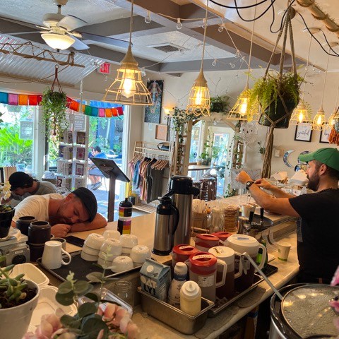 a person cooking food in a restaurant