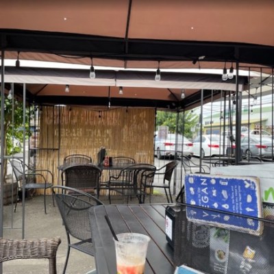 a chair sitting in front of a fence