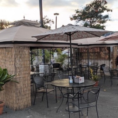 a chair sitting in front of a house