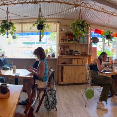 a person sitting at a table in a room