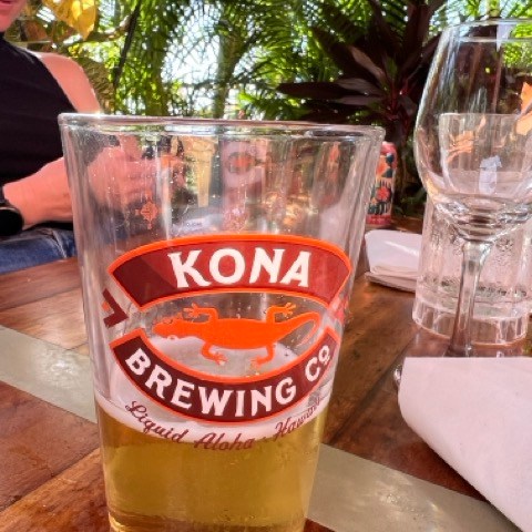 a glass of beer on a table