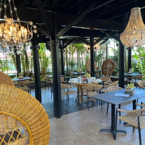 a chair sitting in front of a building