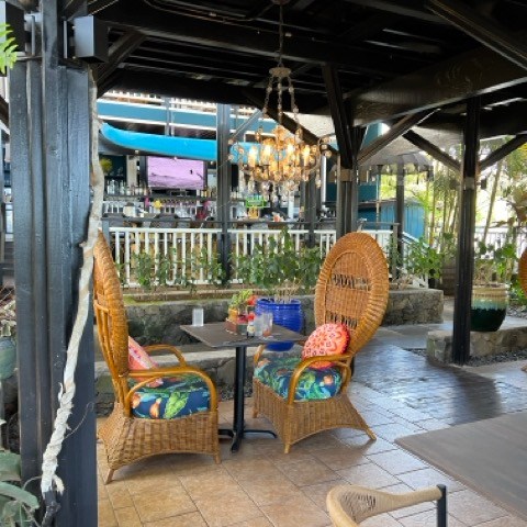 a chair sitting in front of a building