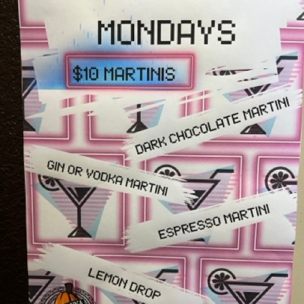 A poster titled martini Mondays $10 martinis