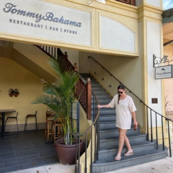 a person standing in front of a building