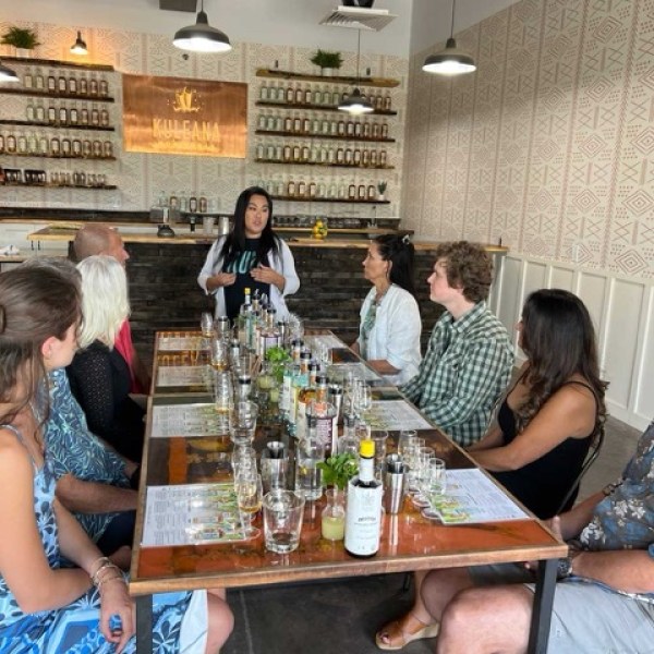 a group of people sitting at a table in a restaurant